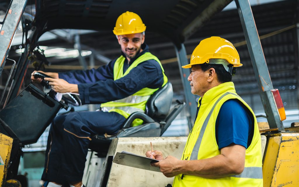 vecteezy warehouse worker talking with forklift operator in factory 24704464